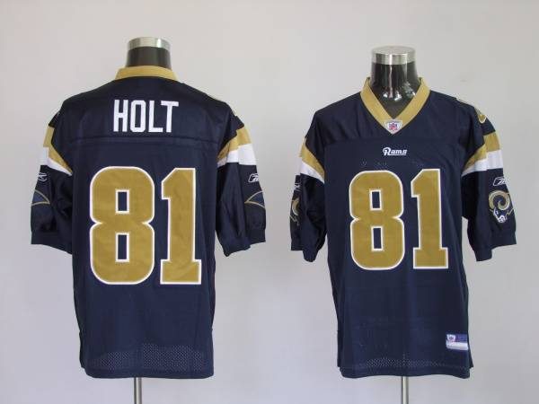 : 2001 Fleer Genuine Torry Holt Rams Genuine Coverage Plus Game  Used Jersey Insert Football Card #NNO : Sports & Outdoors